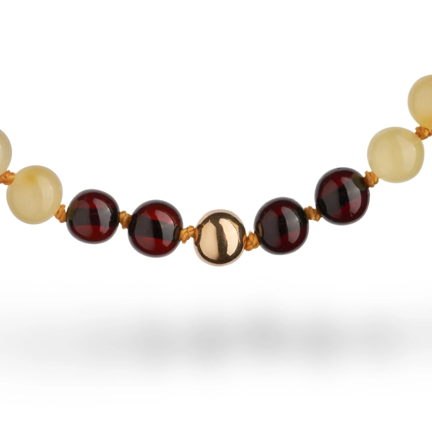 兒童專用琥珀項鍊，採用AU750純金材質。