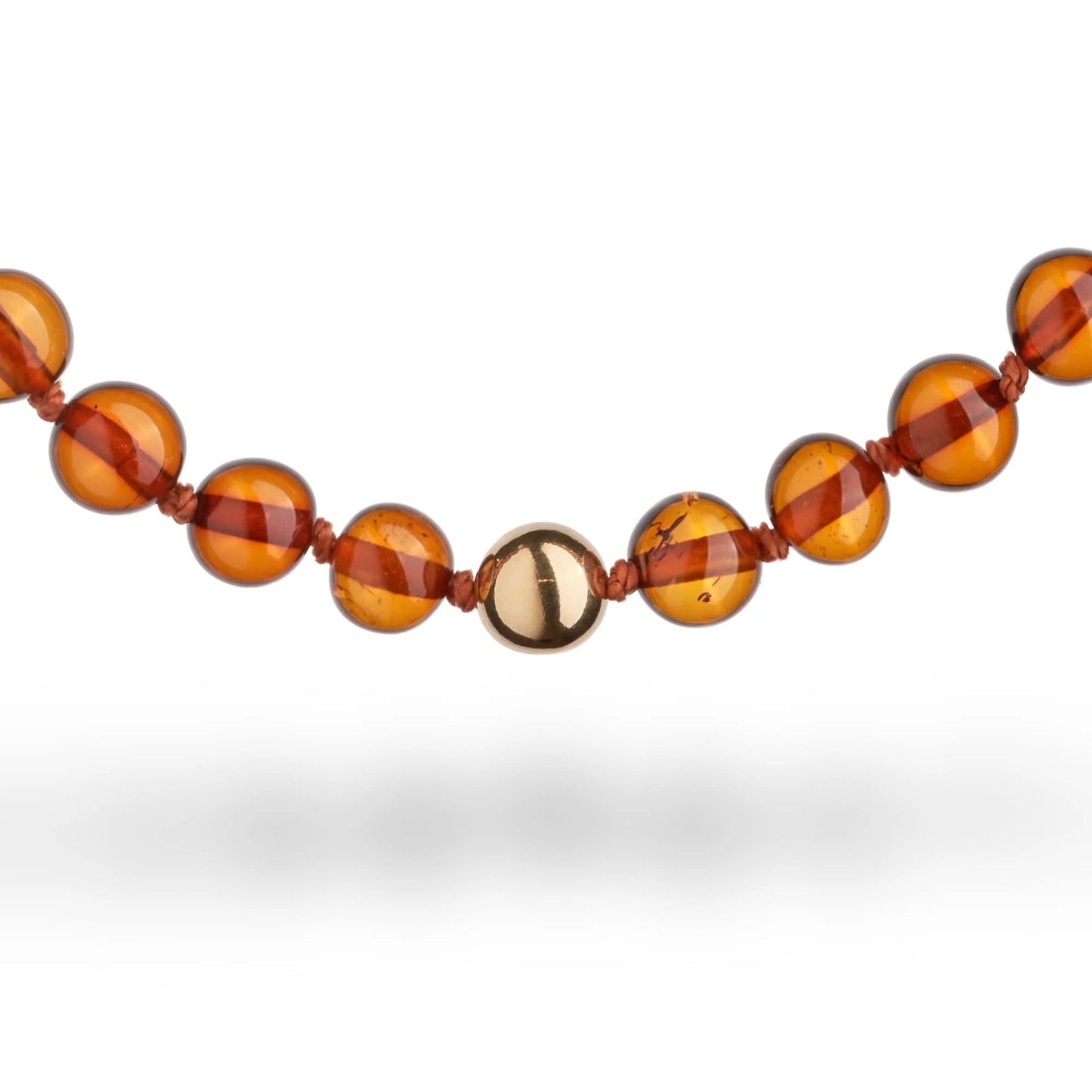 兒童用琥珀項鍊，採用AU750純金製作。