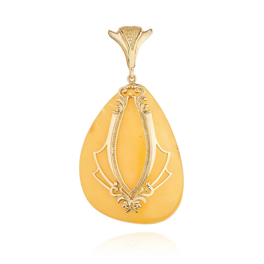 獨一無二的琥珀吊墜，配有AU750純金雕花裝飾。